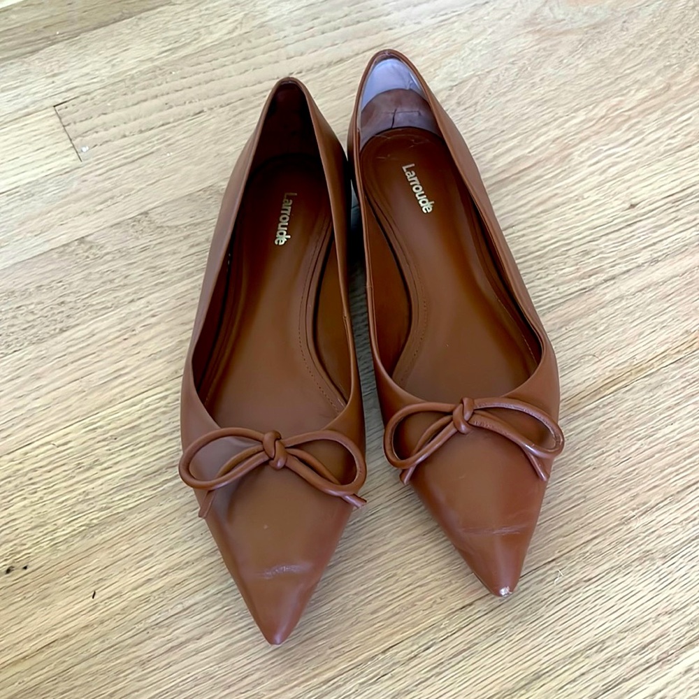 Beautiful Larroude flats. Slight wear at the tip of one that can be polished out